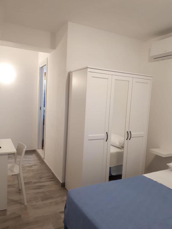 A bed or beds in a room at Cuor di leone guest house