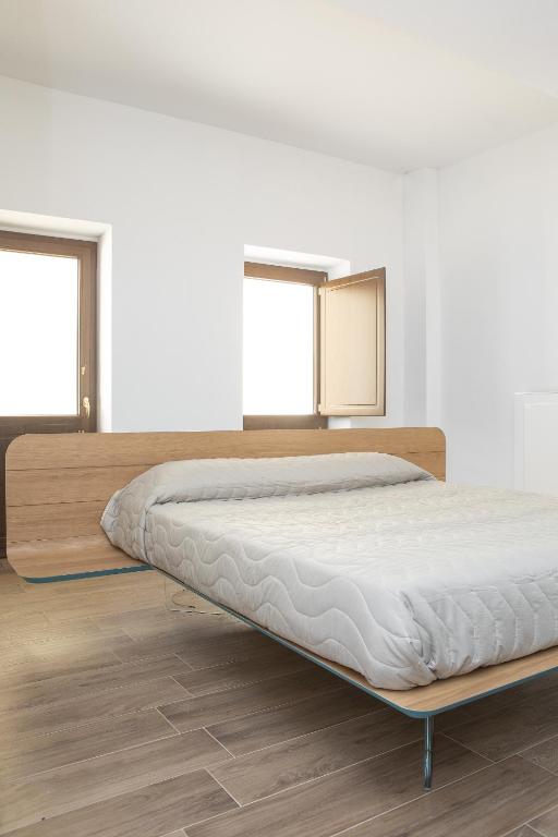 Posteľ alebo postele v izbe v ubytovaní Residenza Cappelli - Case Vacanze