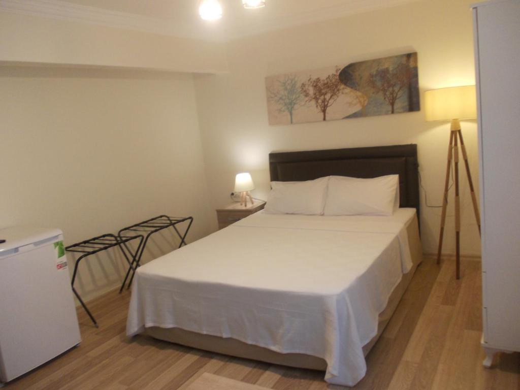 Postel nebo postele na pokoji v ubytování İde Beach Home