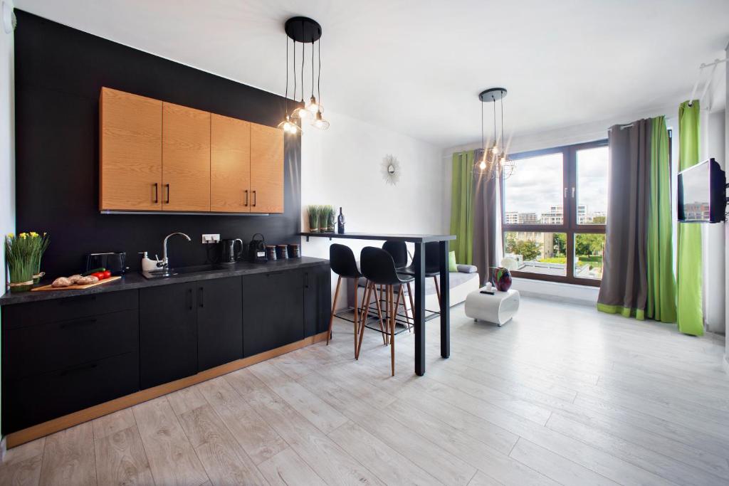 Kuchyňa alebo kuchynka v ubytovaní MODUO Serviced Apartments