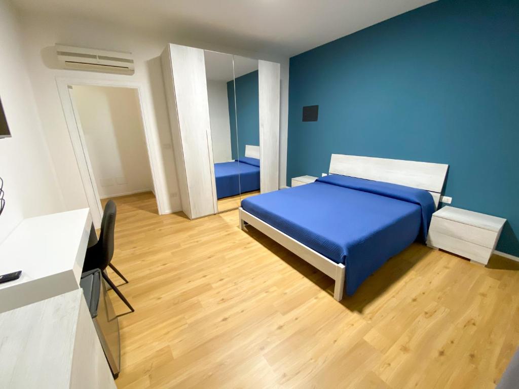 Letto o letti in una camera di The Shell Guest House