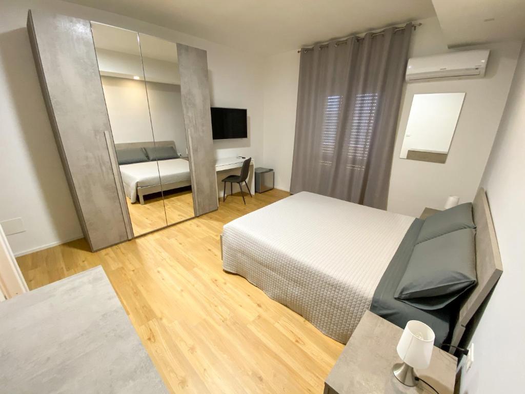 Letto o letti in una camera di The Shell Guest House