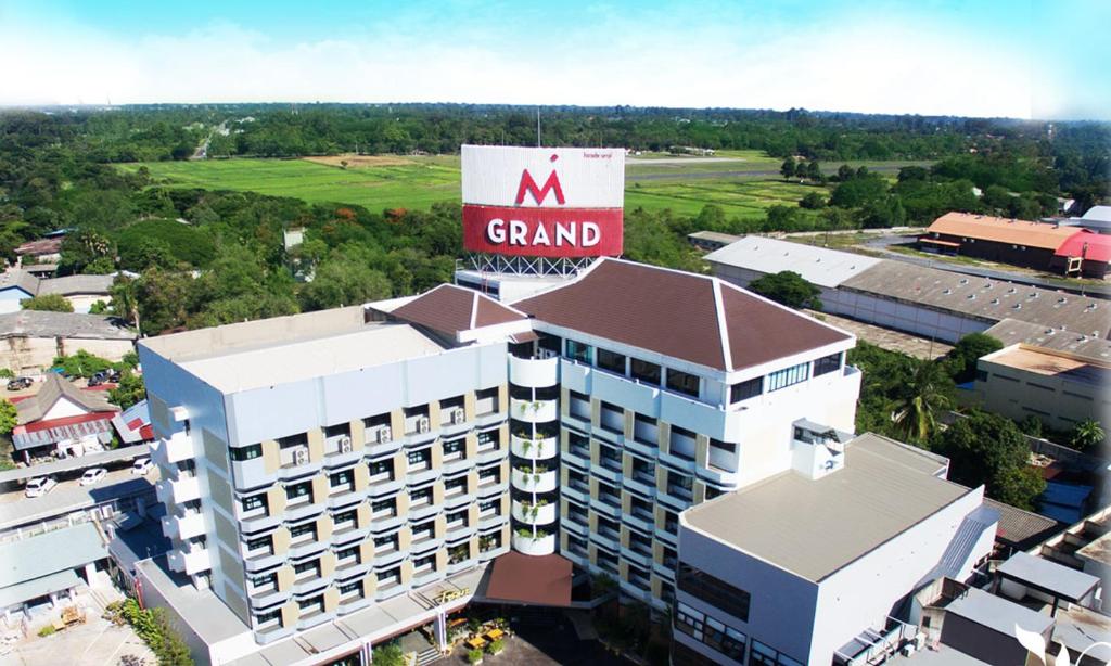 an overhead view of a large building with a giant sign on it at MGRAND in Roi Et