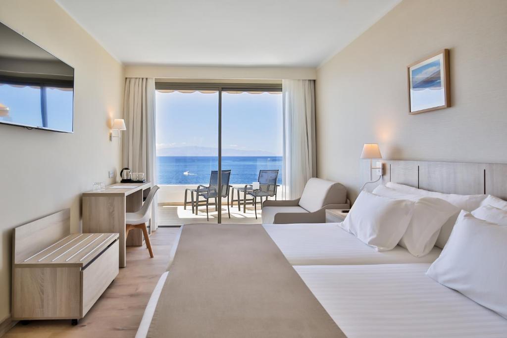 guitarra Corte Literatura Barceló Santiago - Adults Only, Puerto de Santiago – Precios actualizados 2023 guitarra Corte Literatura Barceló Santiago - Adults Only, Puerto de Santiago – Precios actualizados 2023