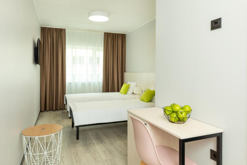 Postel nebo postele na pokoji v ubytování U11 Hotel & SPA