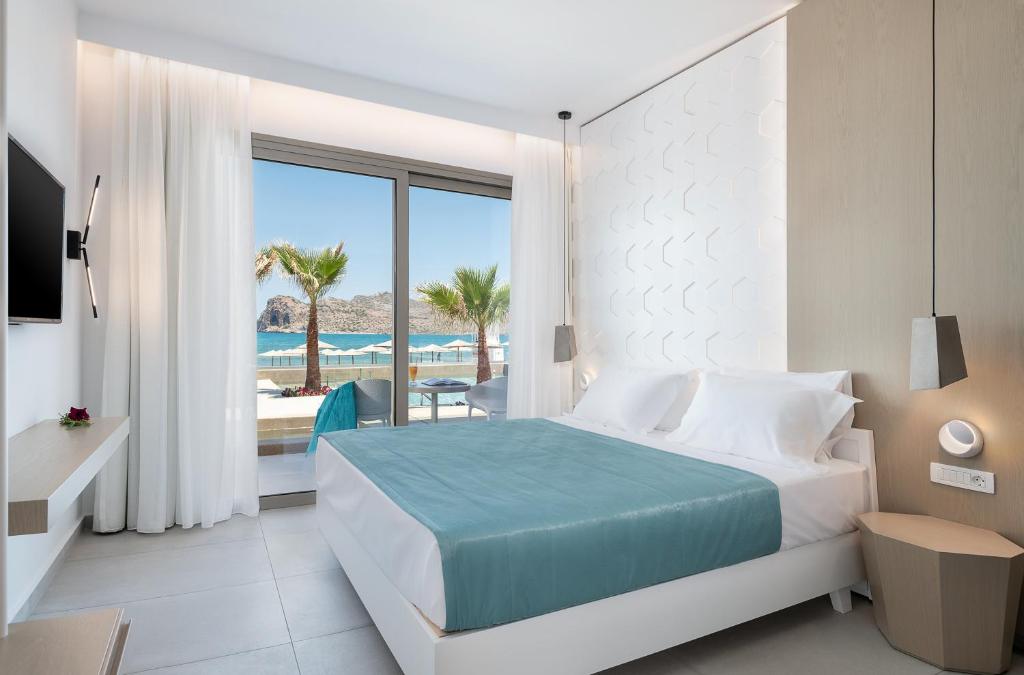 Posteľ alebo postele v izbe v ubytovaní Vergina Beach Hotel