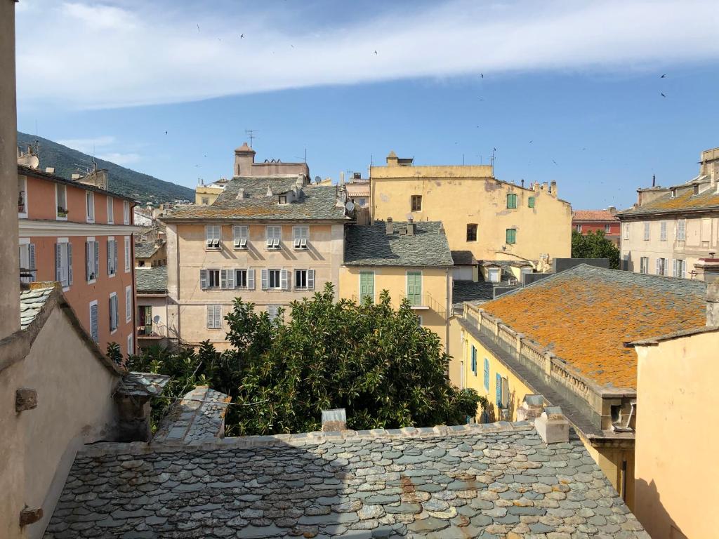 a view of a city with buildings at Appartement Place du Marché Bastia in Bastia