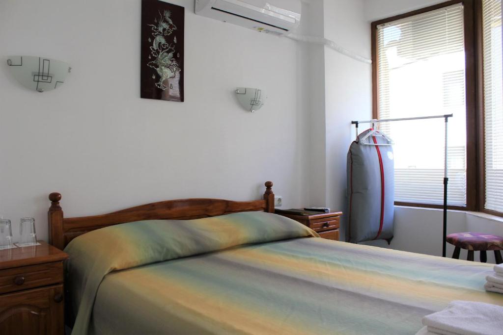 Postel nebo postele na pokoji v ubytování Radik Guest Rooms