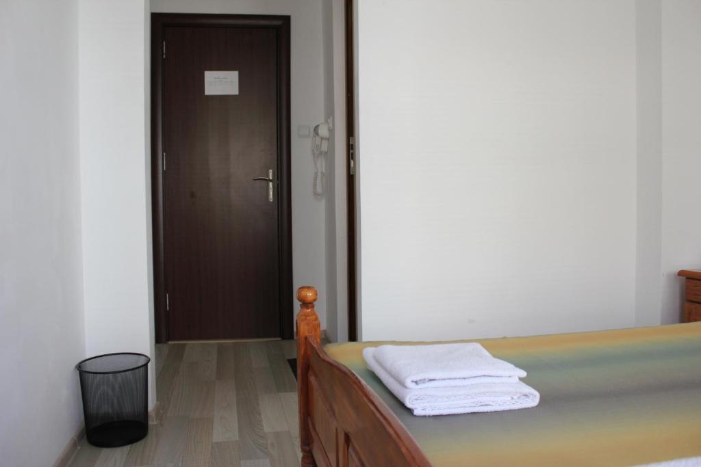 Postel nebo postele na pokoji v ubytování Radik Guest Rooms