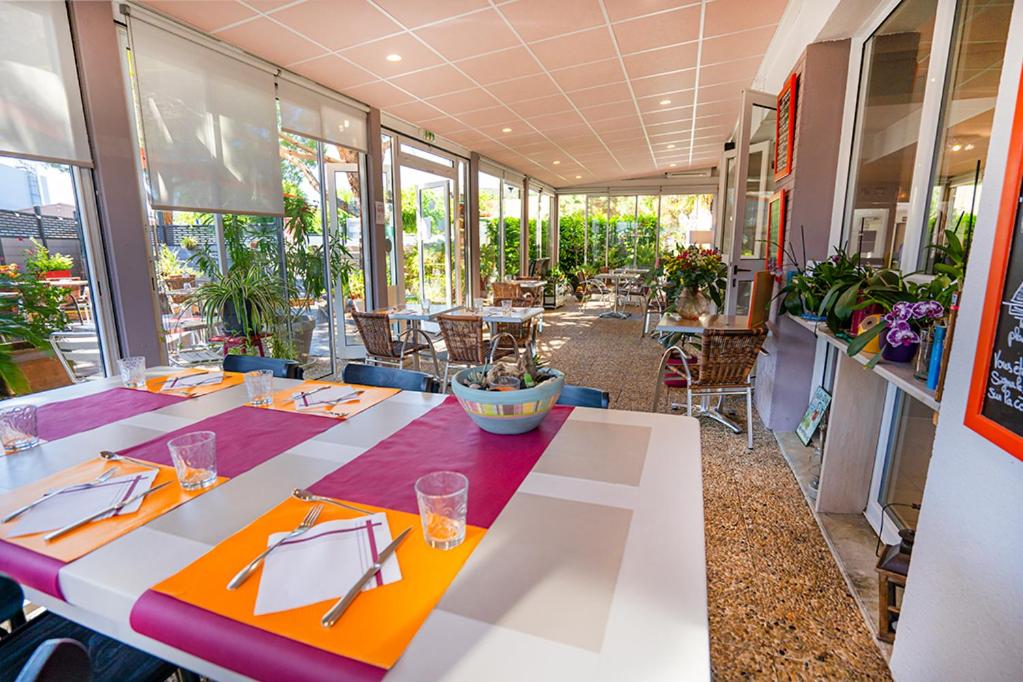 Restaurace v ubytování Logis Hôtel- Hôtel Restaurant Le Rialto