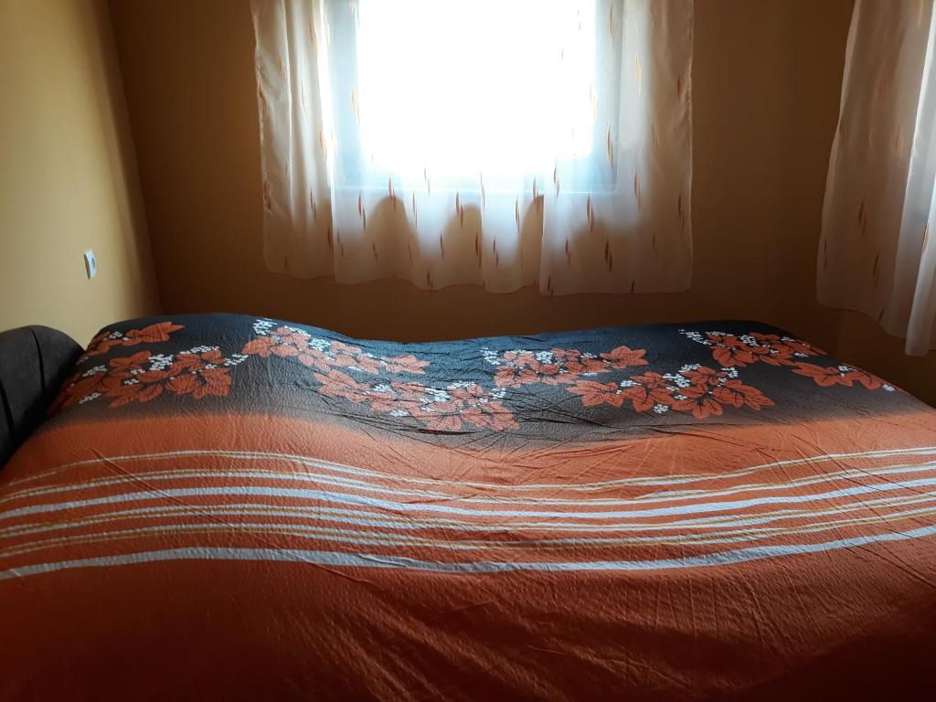 Postel nebo postele na pokoji v ubytování Andi Apartman