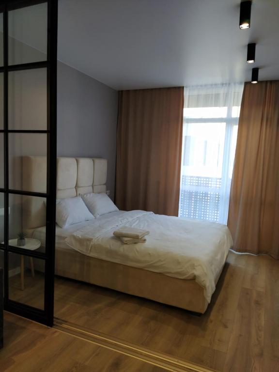 Ένα ή περισσότερα κρεβάτια σε δωμάτιο στο VIP Apartments on Avalon