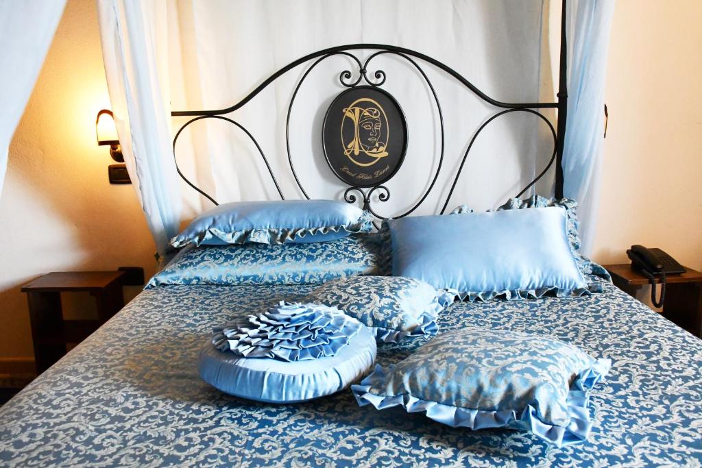 Postel nebo postele na pokoji v ubytování Grand Relais Laurenti