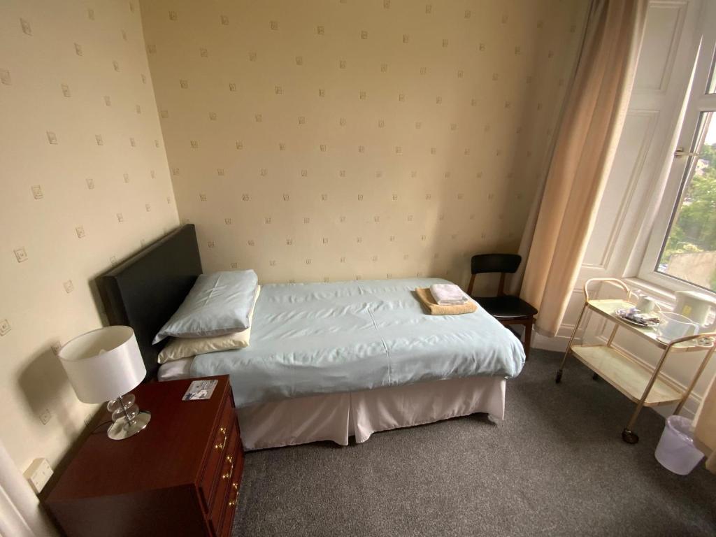 Letto o letti in una camera di Dunrigh Guest House