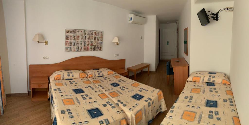 Postel nebo postele na pokoji v ubytování Tarull