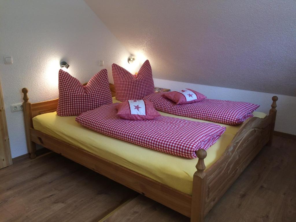 Una cama o camas en una habitación de Ferienhaus Gasthof Kanzlersgrund