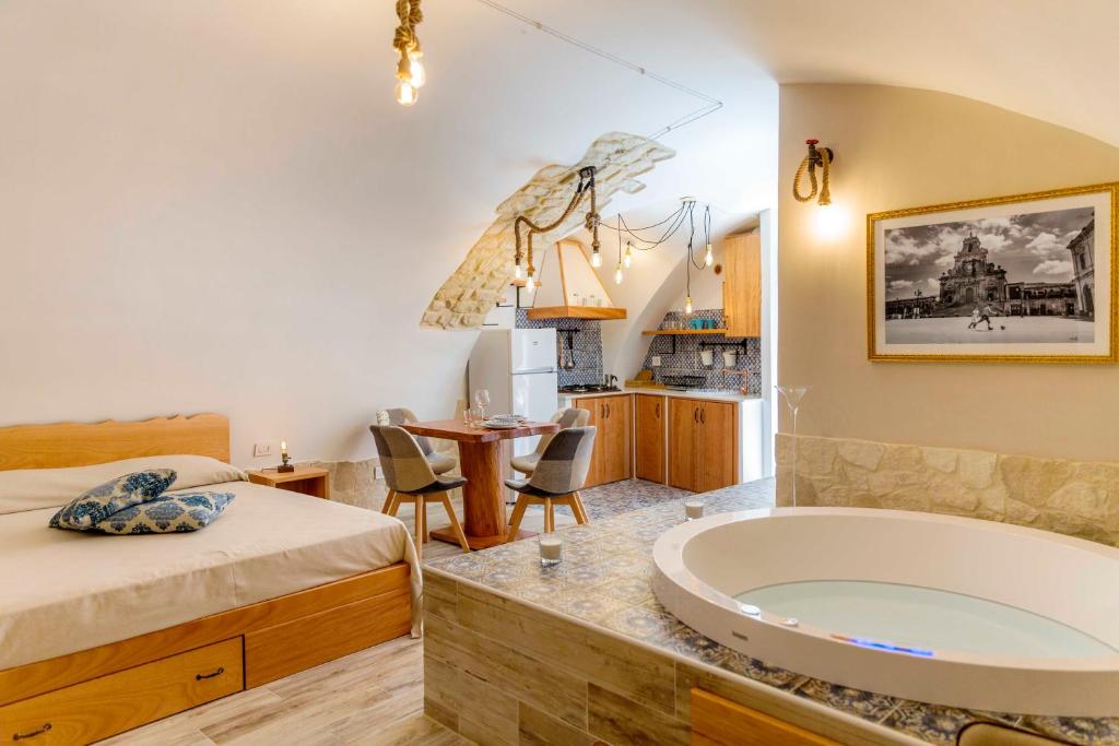 Kuchyň nebo kuchyňský kout v ubytování Il Galletto Viola, luxury room & suite