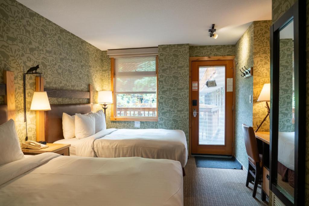 Postel nebo postele na pokoji v ubytování Fox Hotel and Suites