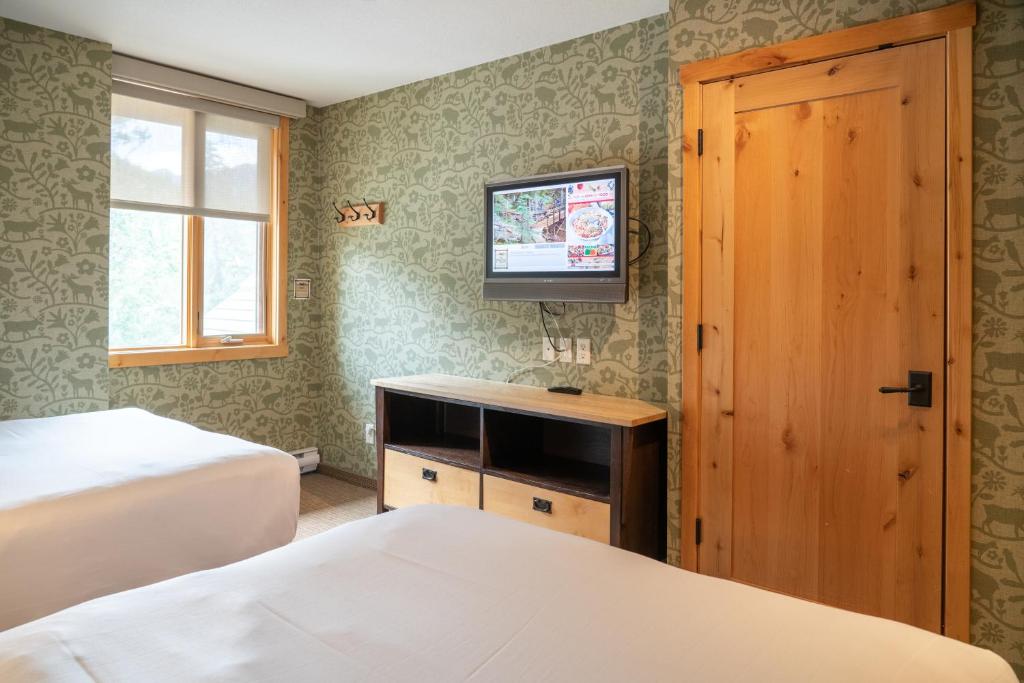Postel nebo postele na pokoji v ubytování Fox Hotel and Suites