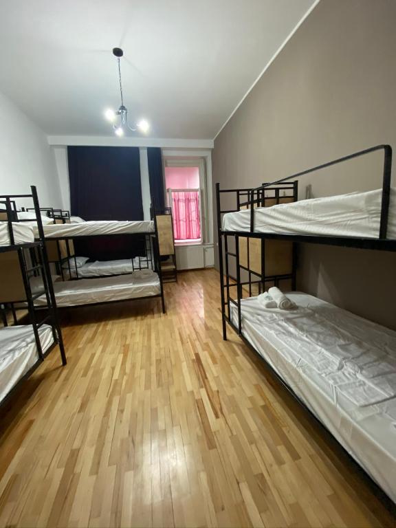 Postel nebo postele na pokoji v ubytování Red Door