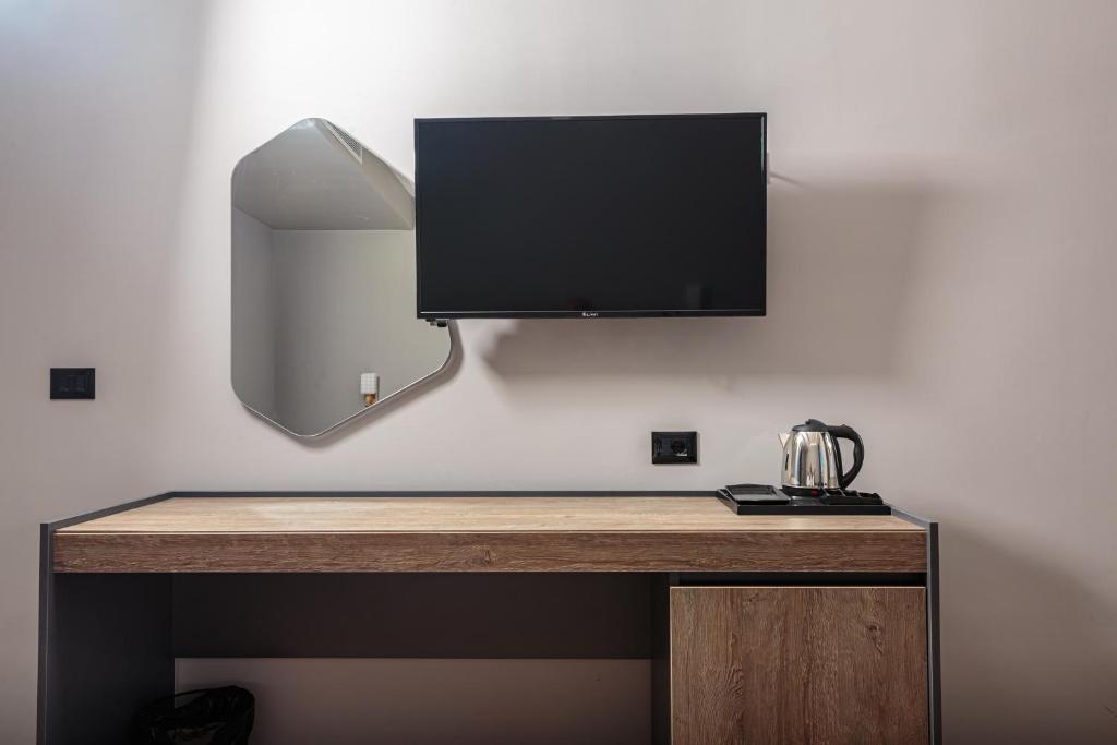 Kuchyň nebo kuchyňský kout v ubytování Real Hotel
