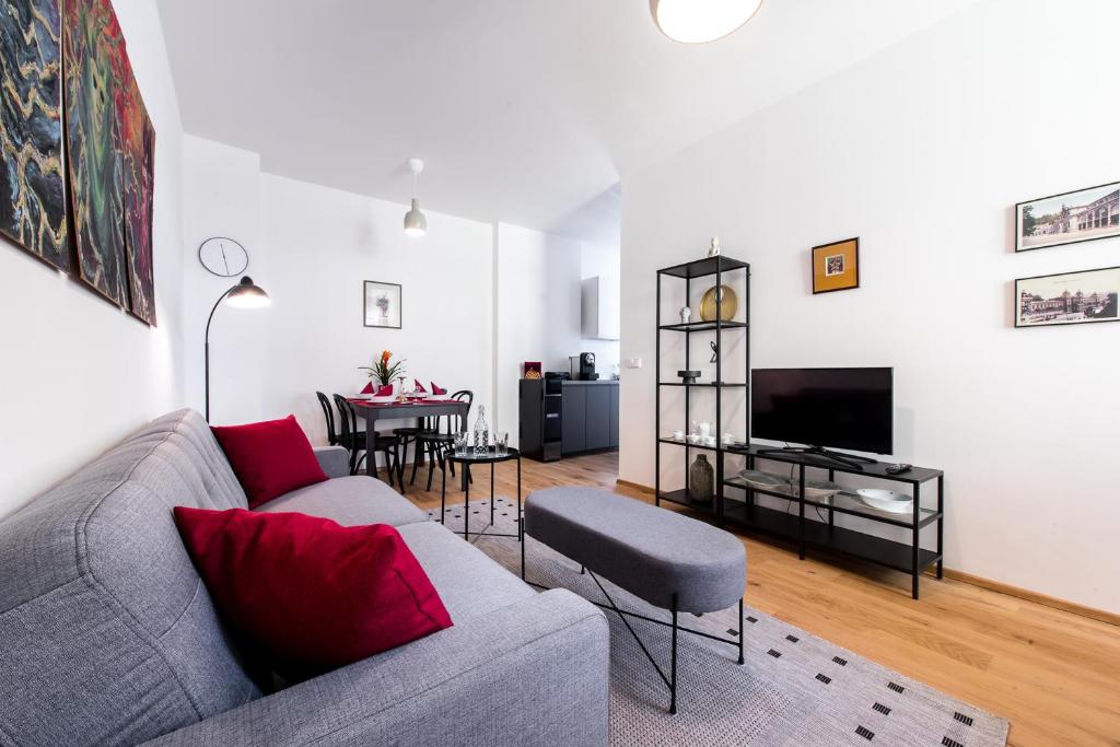 Televízia a/alebo spoločenská miestnosť v ubytovaní Apartment MERAN
