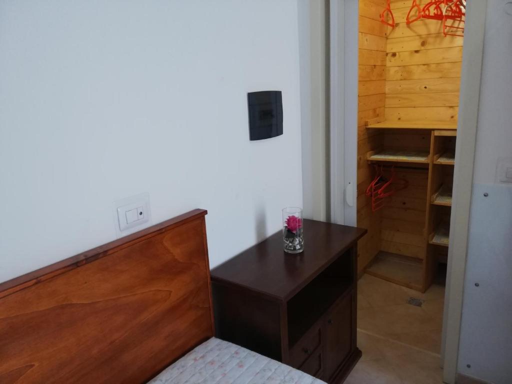 A bed or beds in a room at La Stanza Alternativa