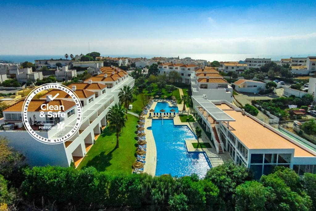 an aerial view of a resort with a swimming pool at Pateo Village in Albufeira