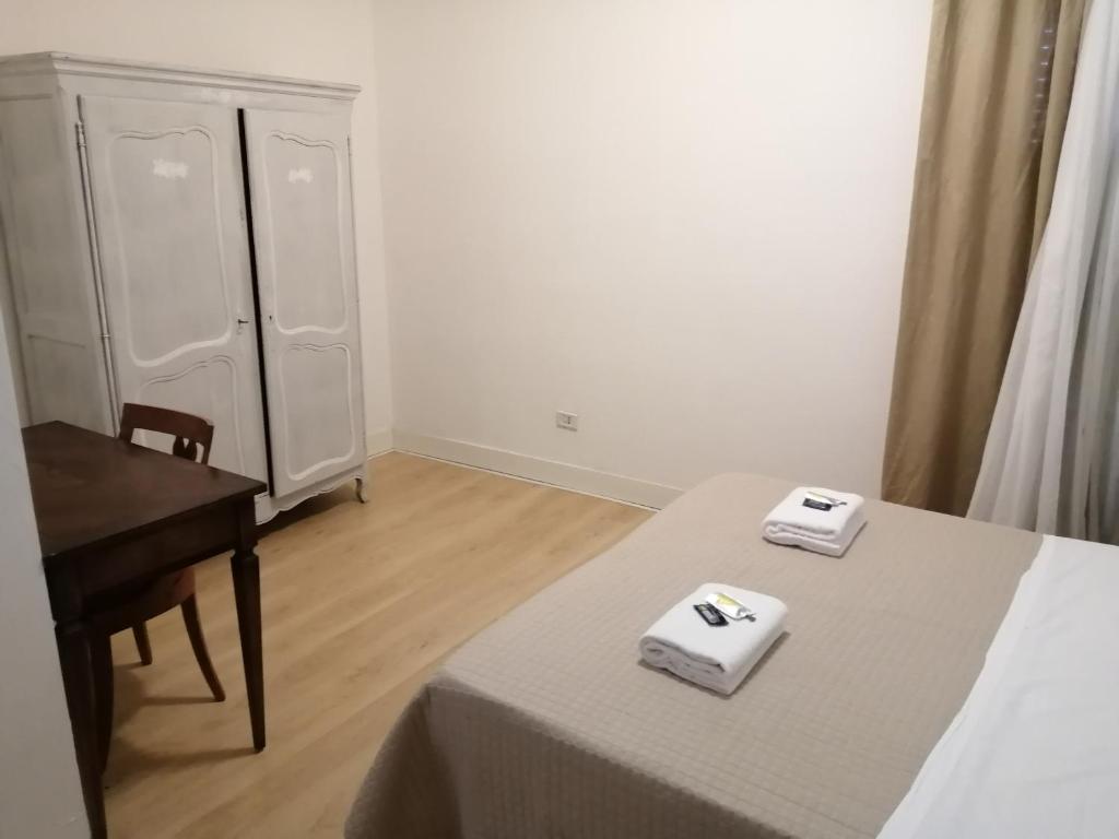 Postel nebo postele na pokoji v ubytování bellaria
