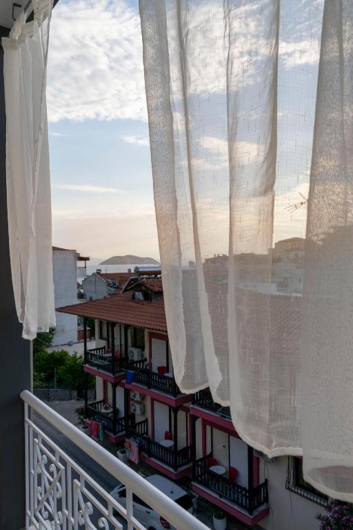 Balkon lub taras w obiekcie Family Inn Apartments&suites