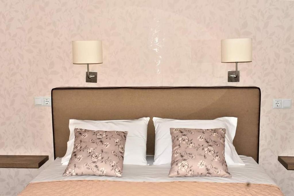Łóżko lub łóżka w pokoju w obiekcie Studios Thea Fresh Rooms Thassos