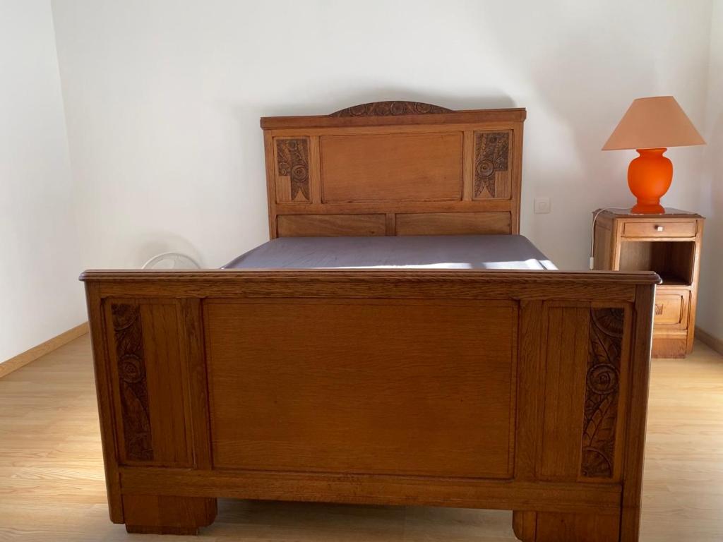 Postel nebo postele na pokoji v ubytování Spacieuse maison dans un parc privée