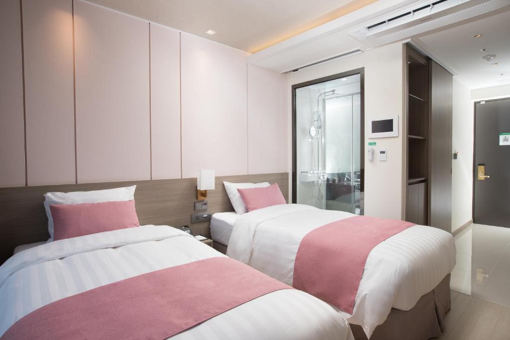 Postel nebo postele na pokoji v ubytování Utop Boutique Hotel&Residence