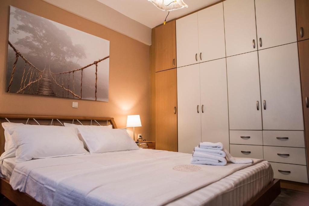 Postel nebo postele na pokoji v ubytování Eirinis House