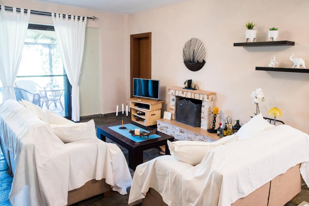 Postel nebo postele na pokoji v ubytování Eirinis House