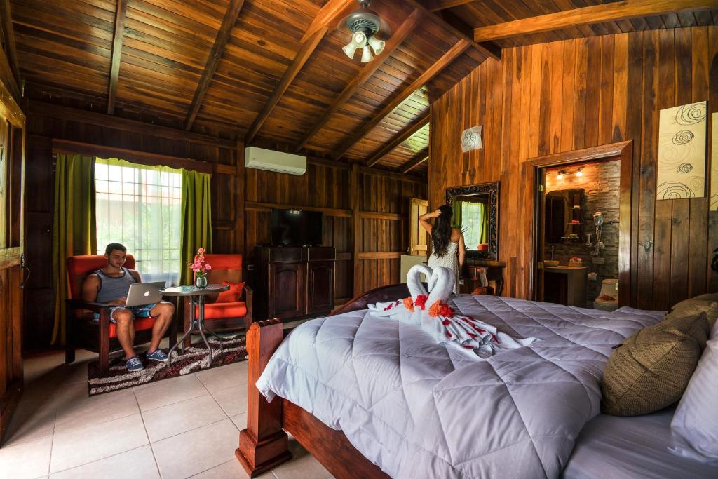 Postel nebo postele na pokoji v ubytování Hotel Rancho Cerro Azul