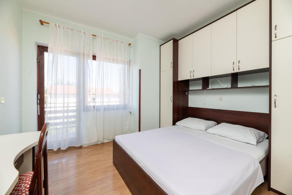 Posteľ alebo postele v izbe v ubytovaní Apartman Petelin