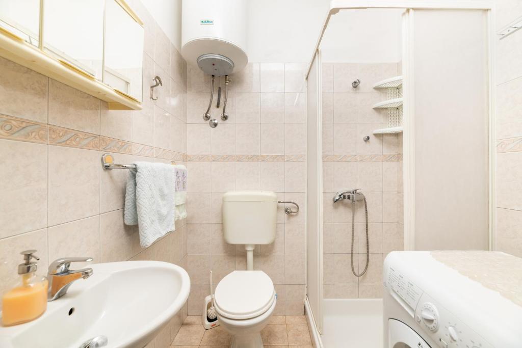 Kúpeľňa v ubytovaní Apartman Petelin