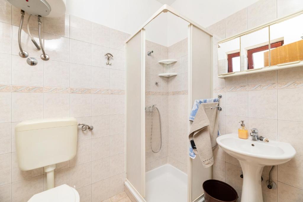 Kúpeľňa v ubytovaní Apartman Petelin