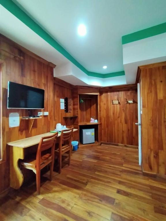 TV a/nebo společenská místnost v ubytování Palmsuay Resort