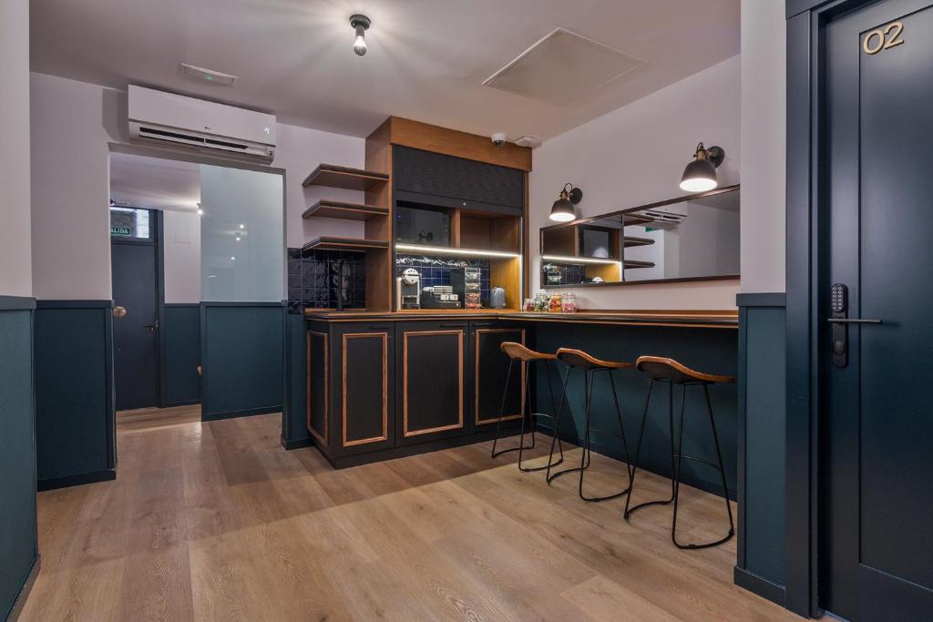 Kuchyň nebo kuchyňský kout v ubytování Uma Suites Atocha