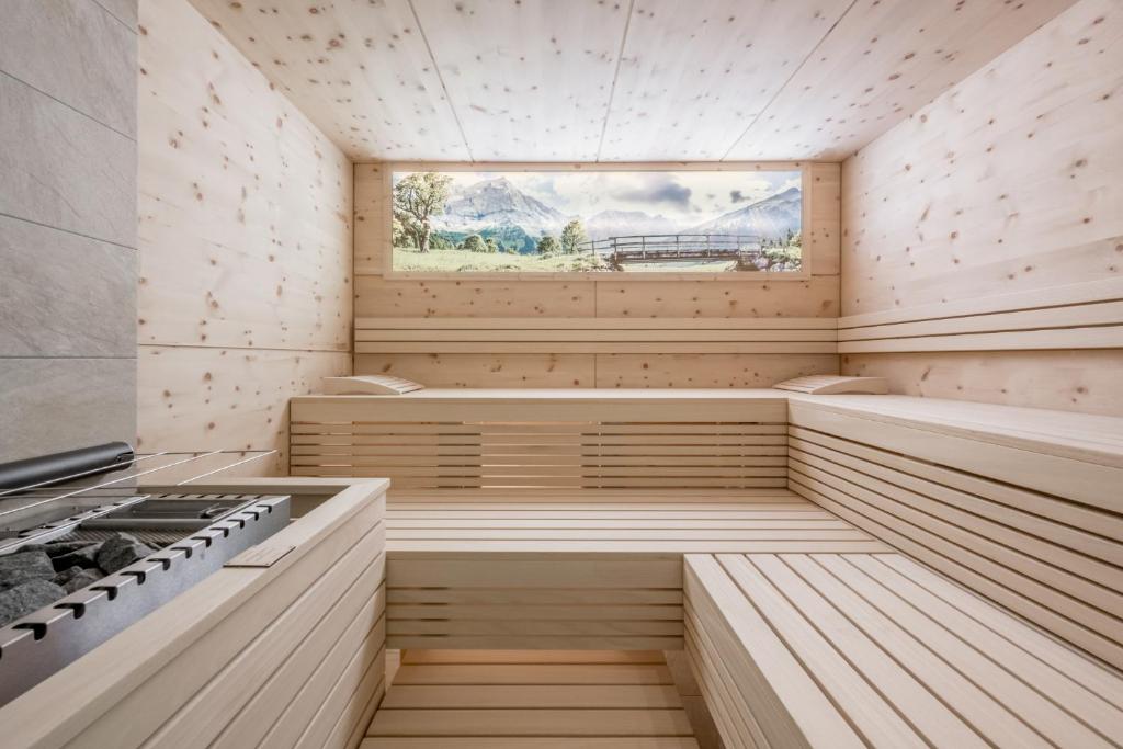Kuchyň nebo kuchyňský kout v ubytování AlpenParks Chalet & Apartment Alpina Seefeld