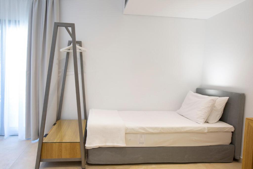 Postel nebo postele na pokoji v ubytování Smile Inn