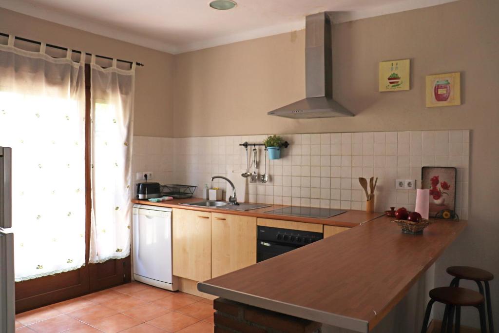 Kuchyň nebo kuchyňský kout v ubytování Casa la Barbacana