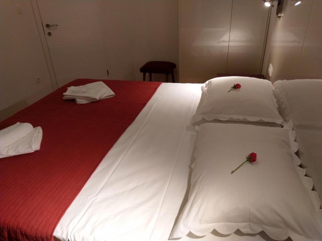 Postel nebo postele na pokoji v ubytování Apartmani Ines