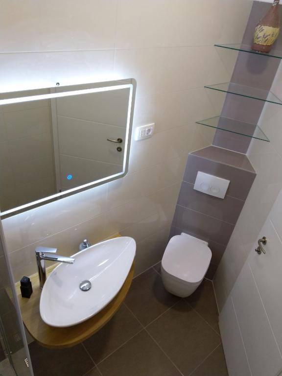 Koupelna v ubytování Apartmani Ines