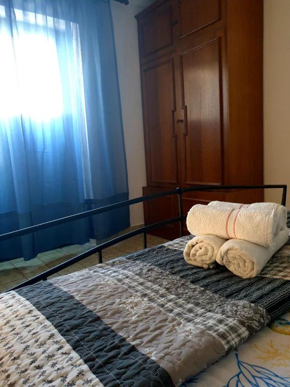 Postel nebo postele na pokoji v ubytování Apartments Galeb