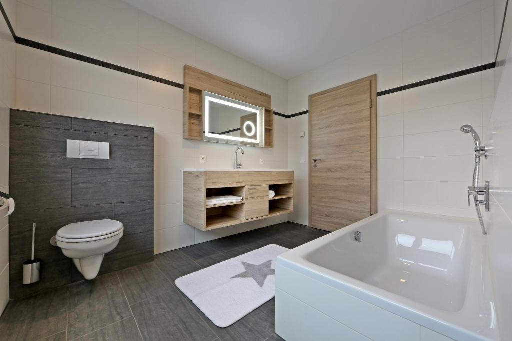 Koupelna v ubytování Apartment Jäger