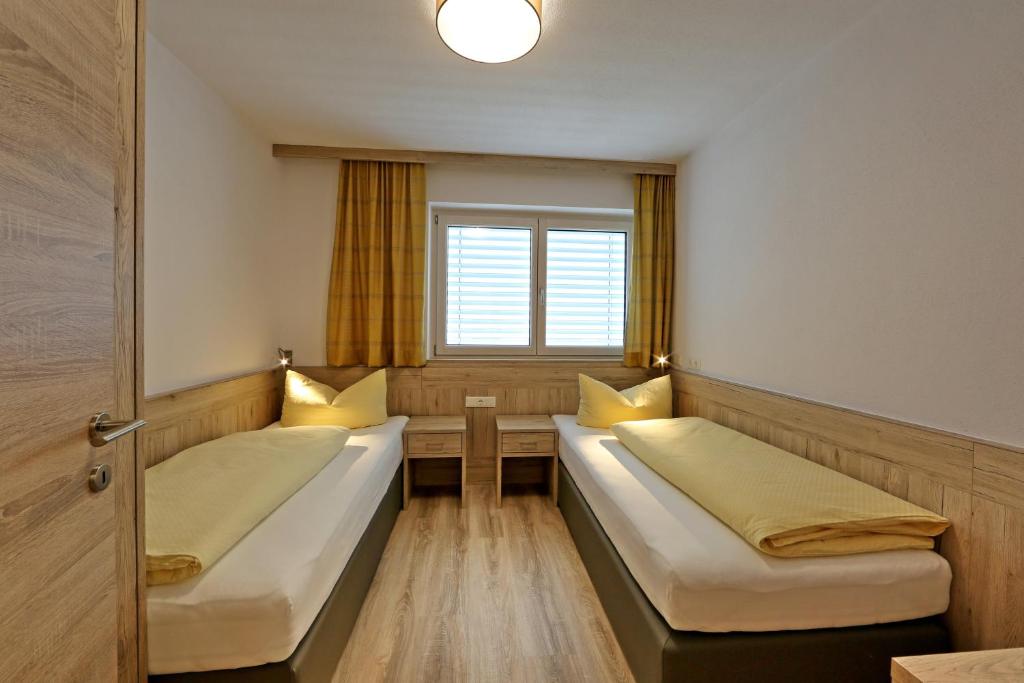 Postel nebo postele na pokoji v ubytování Apartment Jäger