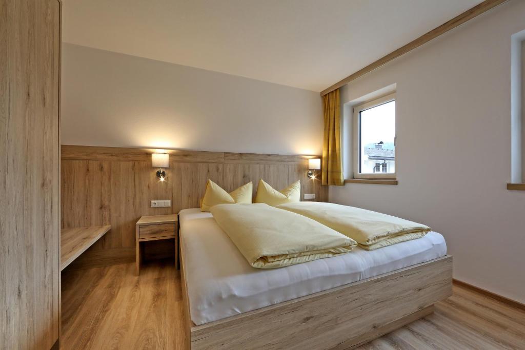 Postel nebo postele na pokoji v ubytování Apartment Jäger